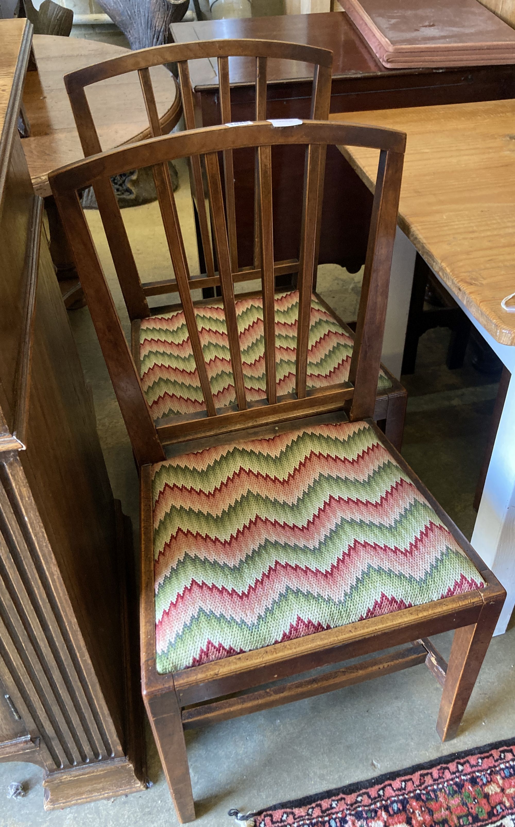 A set of five George III fruitwood cottage dining chairs